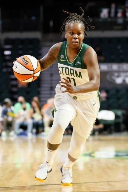 Epiphanny Prince of the Seattle Storm dribbles against the New York Liberty during the first quarter at Angel of the Winds Arena on September 02,...