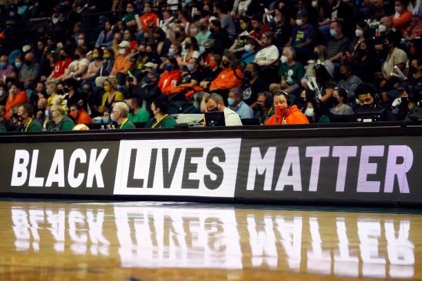 Black Lives Matter sign is displayed on an LED board during the second quarter between the Seattle Storm and the New York Liberty at Angel of the...