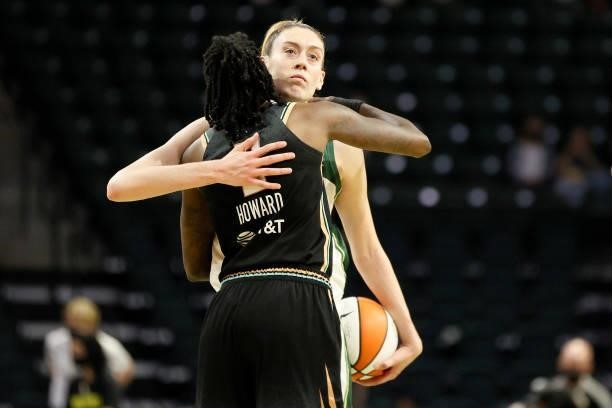 Breanna Stewart of the Seattle Storm hugs Natasha Howard of the New York Liberty after the game at Angel of the Winds Arena on September 02, 2021 in...