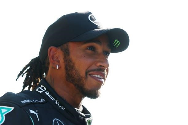 Second place qualifier Lewis Hamilton of Great Britain and Mercedes GP looks on in parc ferme during qualifying ahead of the F1 Grand Prix of The...