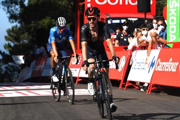Adam Yates of United Kingdom and Team INEOS Grenadiers reacts after crosses the finishing line during the 76th Tour of Spain 2021, Stage 20 a 202,2km...
