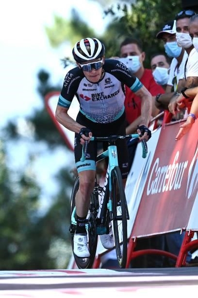 Nicholas Schultz of Australia and Team BikeExchange suffers a mechanical problem before crosses the finishing lineduring the 76th Tour of Spain 2021,...