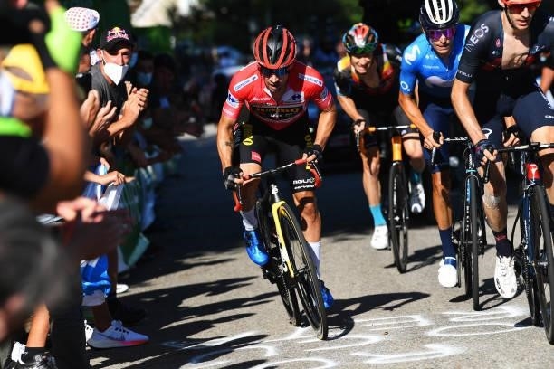 Primoz Roglic of Slovenia and Team Jumbo - Visma red leader jersey and Enric Mas Nicolau of Spain and Movistar Team compete in the breakaway during...
