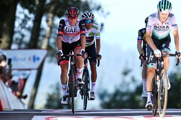 David De La Cruz Melgarejo of Spain and UAE Team Emirates crosses the finishing line during the 76th Tour of Spain 2021, Stage 20 a 202,2km km stage...