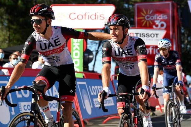 Rui Oliveira of Portugal and Rafal Majka of Poland and UAE Team Emirates cross the finishing line during the 76th Tour of Spain 2021, Stage 20 a...