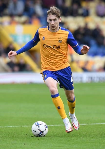 Elliott Hewitt of Mansfield Town runs with the ball during the Sky Bet League Two match between Mansfield Town and Harrogate Town at One Call Stadium...