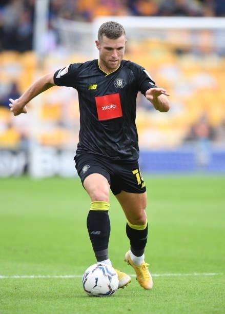 Jack Muldoon of Harrogate Town controls the ball during the Sky Bet League Two match between Mansfield Town and Harrogate Town at One Call Stadium on...