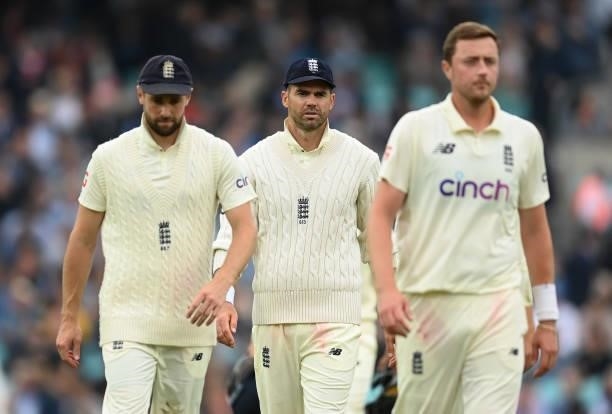 Chris Woakes, James Anderson and Ollie Robinson of England walk off the field during the third day of the 4th LV= Test Match between England and...
