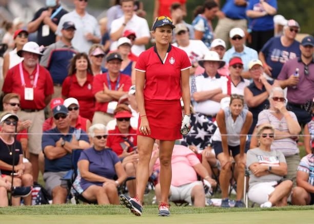 Lexi Thompson of Team USA reacts on the 12th green during the Foursomes Match on day one of the Solheim Cup at the Inverness Club on September 04,...