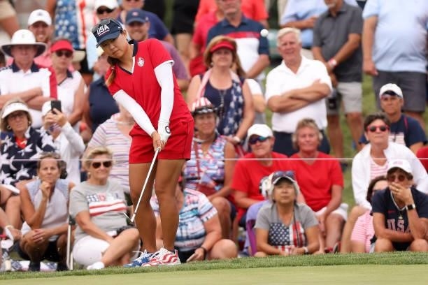 Mina Harigae of Team USA putts on the 12th green during the Foursomes Match on day one of the Solheim Cup at the Inverness Club on September 04, 2021...