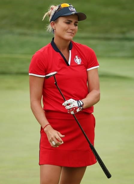 Lexi Thompson of Team USA reacts after missing a putt on the 15th green during the Foursomes Match on day one of the Solheim Cup at the Inverness...