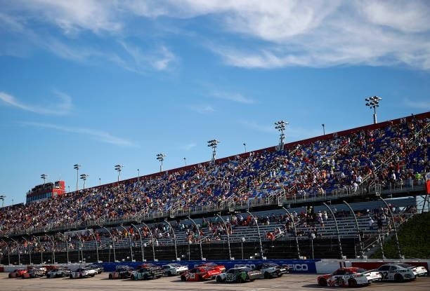 General view of racing past the grandstands during the NASCAR Xfinity Series Sport Clips Haircuts VFW Help A Hero 200 at Darlington Raceway on...