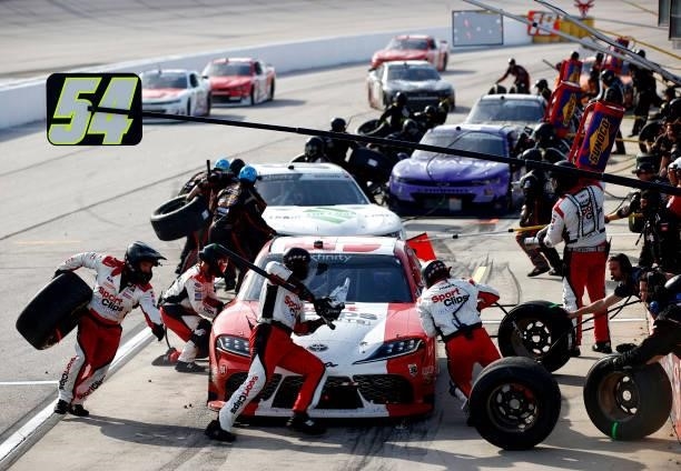 Denny Hamlin, driver of the SportClips Haircuts Toyota, pits during the NASCAR Xfinity Series Sport Clips Haircuts VFW Help A Hero 200 at Darlington...