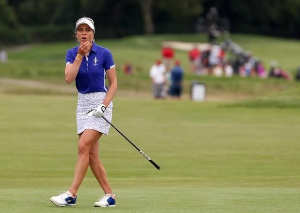 Sophia Popov of Team Europe reacts on the 18th green during the Foursomes Match on day one of the Solheim Cup at the Inverness Club on September 04,...