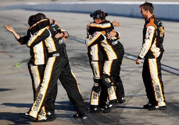 The pit crew of the Bass Pro Shops/TrueTimber/BRCC Chevrolet, celebrates after Noah Gragson wins the NASCAR Xfinity Series Sport Clips Haircuts VFW...