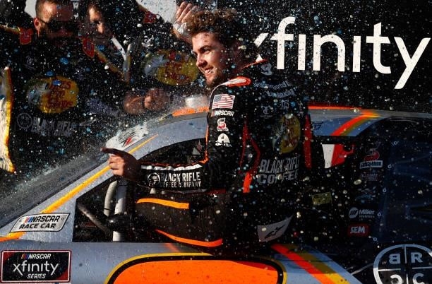 Noah Gragson, driver of the Bass Pro Shops/TrueTimber/BRCC Chevrolet, celebrates in the Ruoff Mortgage victory lane after winning the NASCAR Xfinity...