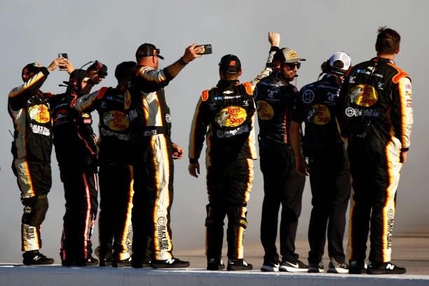 Crew members of the Bass Pro Shops/TrueTimber/BRCC Chevrolet, celebrate after Noah Gragson wins the NASCAR Xfinity Series Sport Clips Haircuts VFW...
