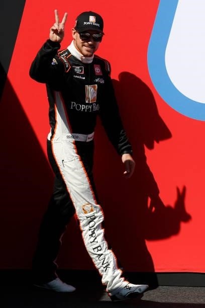 Daniel Hemric, driver of the Poppy Bank Toyota, waves to fans during pre-race ceremonies prior to the NASCAR Xfinity Series Sport Clips Haircuts VFW...