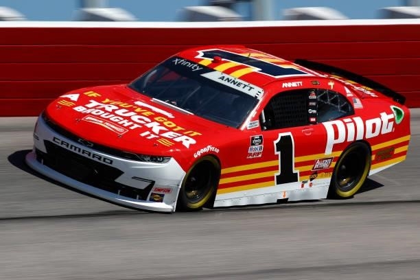 Michael Annett, driver of the PFJ Thank A Trucker Chevrolet, drives during the NASCAR Xfinity Series Sport Clips Haircuts VFW Help A Hero 200 at...