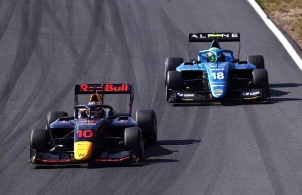 Jak Crawford of United States and Hitech Grand Prix leads Caio Collet of Brazil and MP Motorsport during race 3 of Round 6:Zandvoort of the Formula 3...