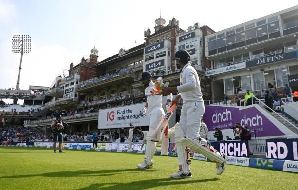 India batsmen Virat Kohli and Ravindra Jadeja walk out ahead of day four of the Fourth LV= Insurance Test Match between England and India at The Kia...