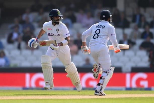 Virat Kohli and Ravindra Jadeja of India take a quick single during the Fourth LV= Insurance Test Match: Day Four between England and India at The...