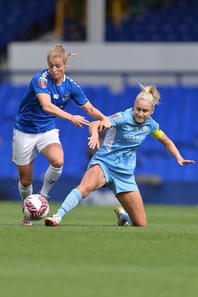 Anna Anvegard of Everton Women and Steph Houghton challenge for the ball during the Barclays FA Women's Super League match between Everton Women and...