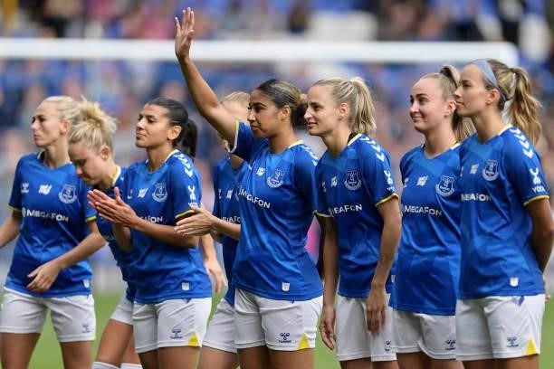 Gabby George of Everton Women waves to fans as she lines up with Kenza Dali Nathalie Bjorn Megan Finnigan and team mates during the Barclays FA...