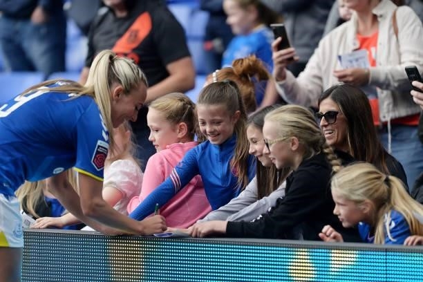 Toni Duggan of Everton Women signs autographs for the fans after the Barclays FA Women's Super League match between Everton Women and Manchester City...