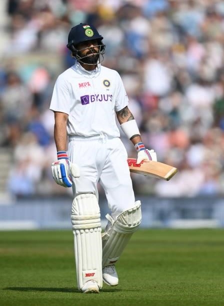 India captain Virat Kohli leaves the field after being dismissed by Moeen Ali of England during day four of the Fourth LV= Insurance Test Match...