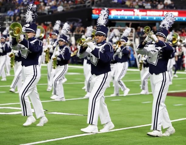 The Brigham Young Cougars' the Power of the Wasatch marching band performs before the Cougars play in the Good Sam Vegas Kickoff Classic against the...