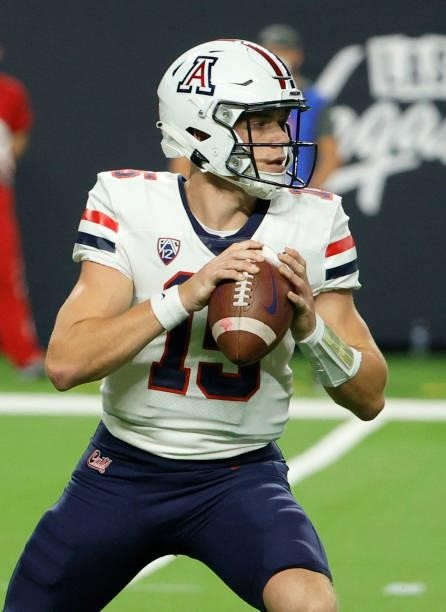 Quarterback Will Plummer of the Arizona Wildcats looks to throw against the Brigham Young Cougars during the Good Sam Vegas Kickoff Classic at...