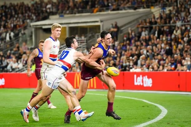 Oscar McInerney of the Lions controls the ball under pressure during the AFL 1st Semi Final match between the Brisbane Lions and the Western Bulldogs...
