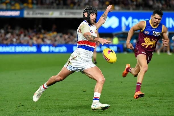 Caleb Daniel of the Bulldogs kicks the ball during the AFL 1st Semi Final match between the Brisbane Lions and the Western Bulldogs at The Gabba on...