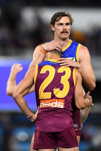 Joe Daniher of the Lions consoles team mate Charlie Cameron after their defeat during the AFL 1st Semi Final match between the Brisbane Lions and the...