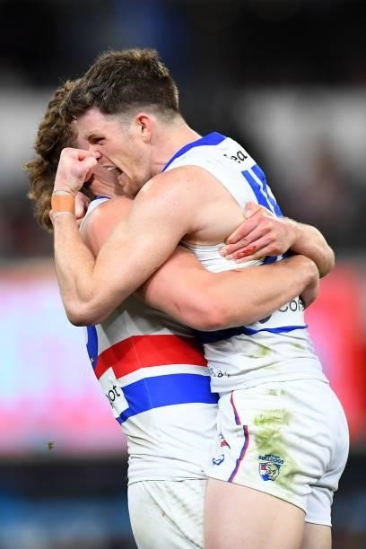 Aaron Naughton and Taylor Duryea of the Bulldogs celebrate victory during the AFL 1st Semi Final match between the Brisbane Lions and the Western...