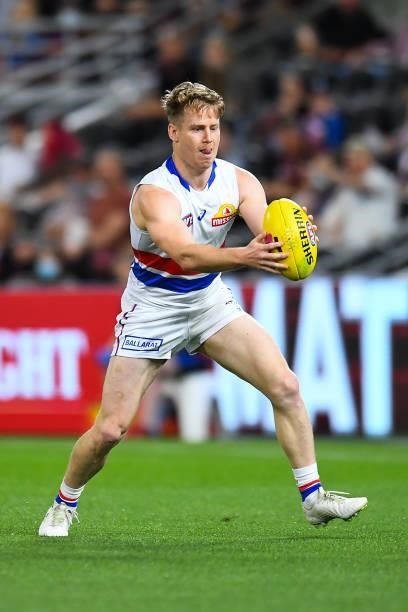 Lachie Hunter of the Bulldogs in action during the AFL 1st Semi Final match between the Brisbane Lions and the Western Bulldogs at The Gabba on...