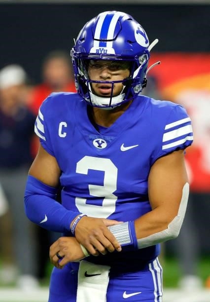 Quarterback Jaren Hall of the Brigham Young Cougars looks to his sideline before a play against the Arizona Wildcats during the Good Sam Vegas...