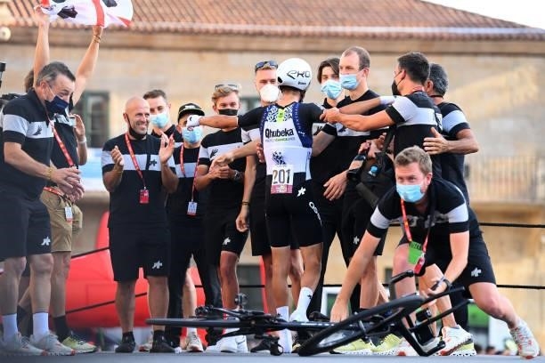 Fabio Aru of Italy and Team Qhubeka Nexthash with his teammates celebrate the last day of his professional career after the 76th Tour of Spain 2021,...