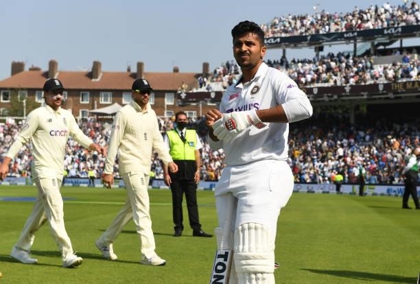 Shardul Thakur of India leaves the field for the tea break during the fourth day of the 4th LV= Test Match between England and India at The Kia Oval...