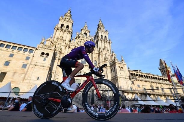 Oscar Cabedo Carda of pain and Team Burgos - BH competes in the Plaza del Obradoiro with the Cathedral in the background during the 76th Tour of...