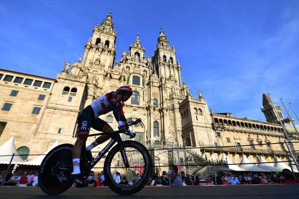 Ryan Gibbons of South Africa and UAE Team Emirates competes in the Plaza del Obradoiro with the Cathedral in the background during the 76th Tour of...