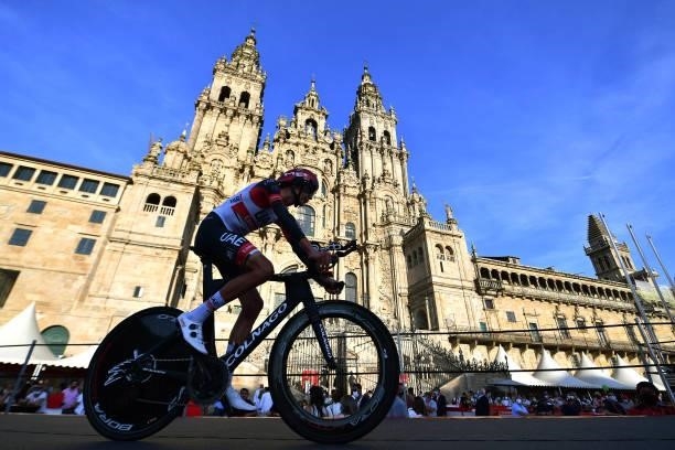 Joseph Lloyd Dombrowski of United States and UAE Team Emirates competes in the Plaza del Obradoiro with the Cathedral in the background during the...