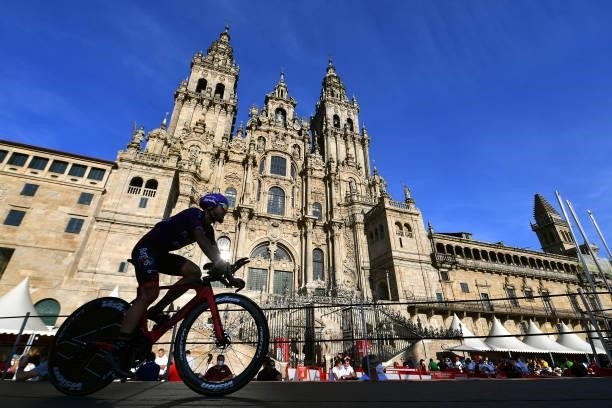 Ángel Madrazo Ruiz of Spain and Team Burgos - BH competes in the Plaza del Obradoiro with the Cathedral in the background during the 76th Tour of...