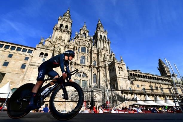 Thomas Pidcock of United Kingdom and Team INEOS Grenadiers competes in the Plaza del Obradoiro with the Cathedral in the background during the 76th...