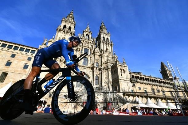 Imanol Erviti of Spain and Movistar Team competes in the Plaza del Obradoiro with the Cathedral in the background during the 76th Tour of Spain 2021,...
