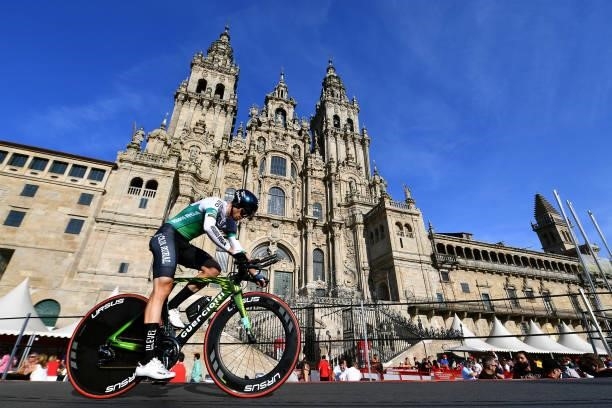 Alvaro Cuadros Morata of Spain and Team Caja Rural-Seguros RGA competes in the Plaza del Obradoiro with the Cathedral in the background during the...