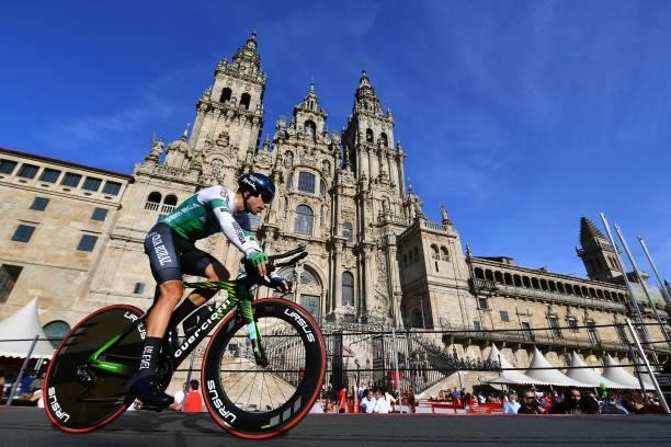Aritz Bagues Kalparsoro of Spain and Team Caja Rural-Seguros RGA competes in the Plaza del Obradoiro with the Cathedral in the background during the...