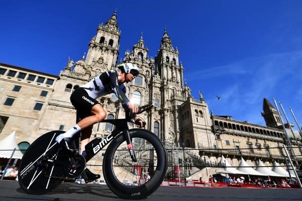 Dimitri Claeys of Belgium and Team Qhubeka Nexthash competes in the Plaza del Obradoiro with the Cathedral in the background during the 76th Tour of...