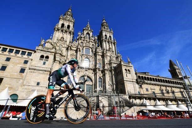 Patrick Gamper of Austria and Team Bora - Hansgrohe competes in the Plaza del Obradoiro with the Cathedral in the background during the 76th Tour of...